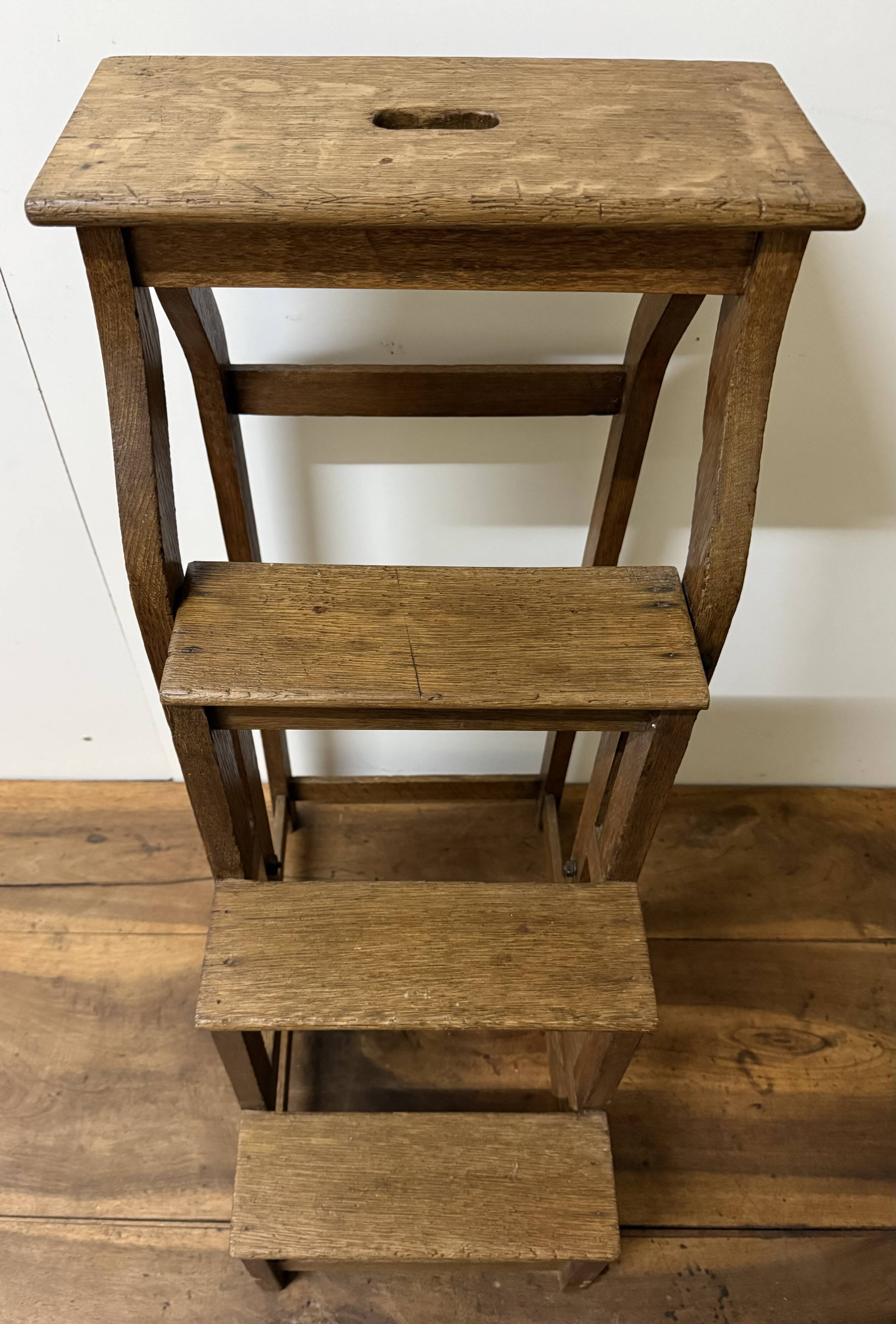 Stool transforming into a step ladder.