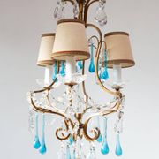 Italian chandelier in gold metal cage with blue drops circa 1960