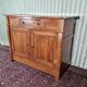 Low walnut sideboard with cross, Restoration period, 19th century