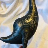 Damascened metal bird sculpture