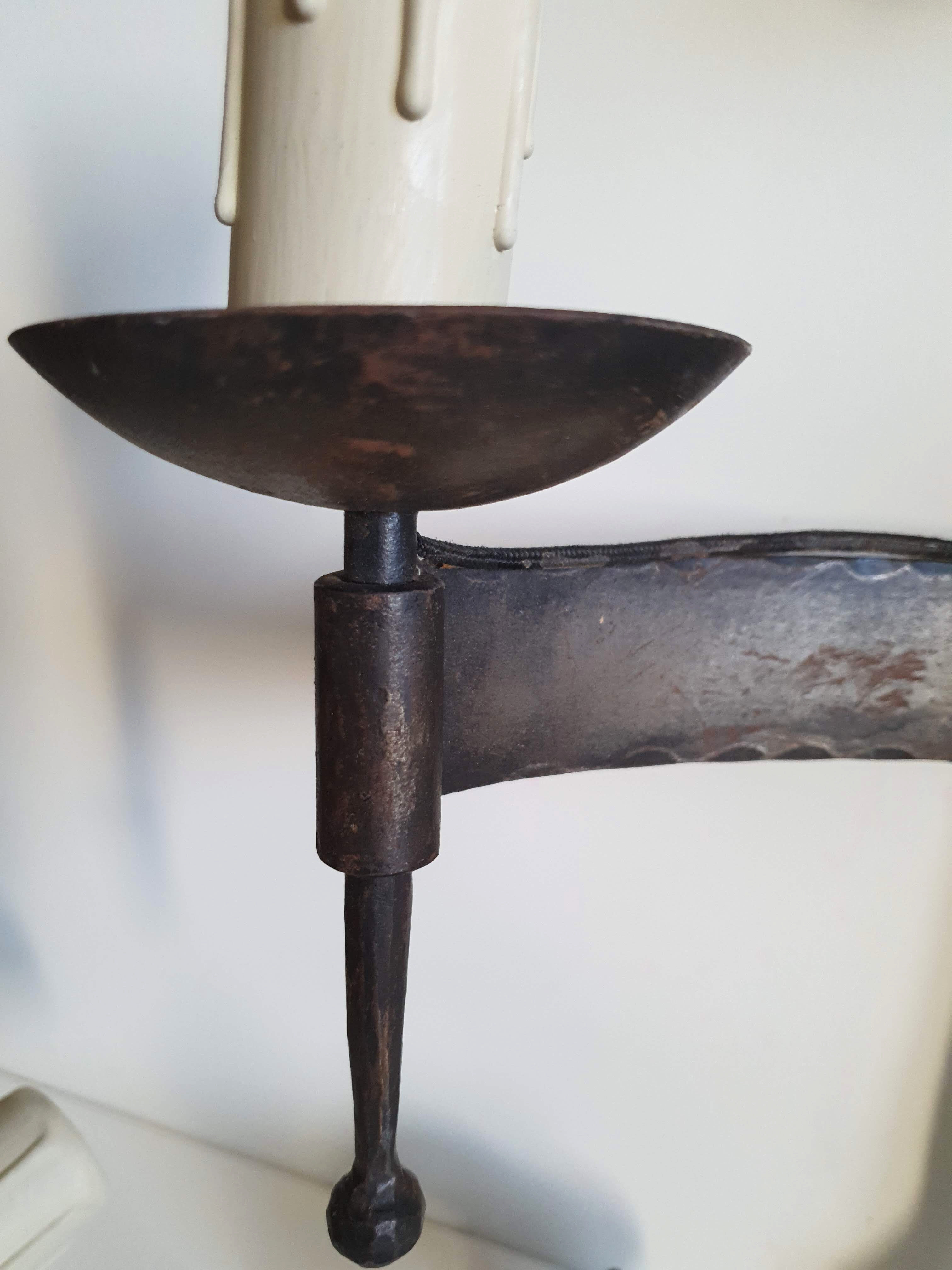 Duo of wrought iron wall lamps by Jean Touret Atelier Marolles