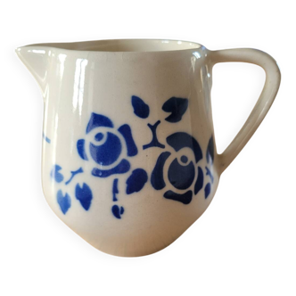 Antique milk jug