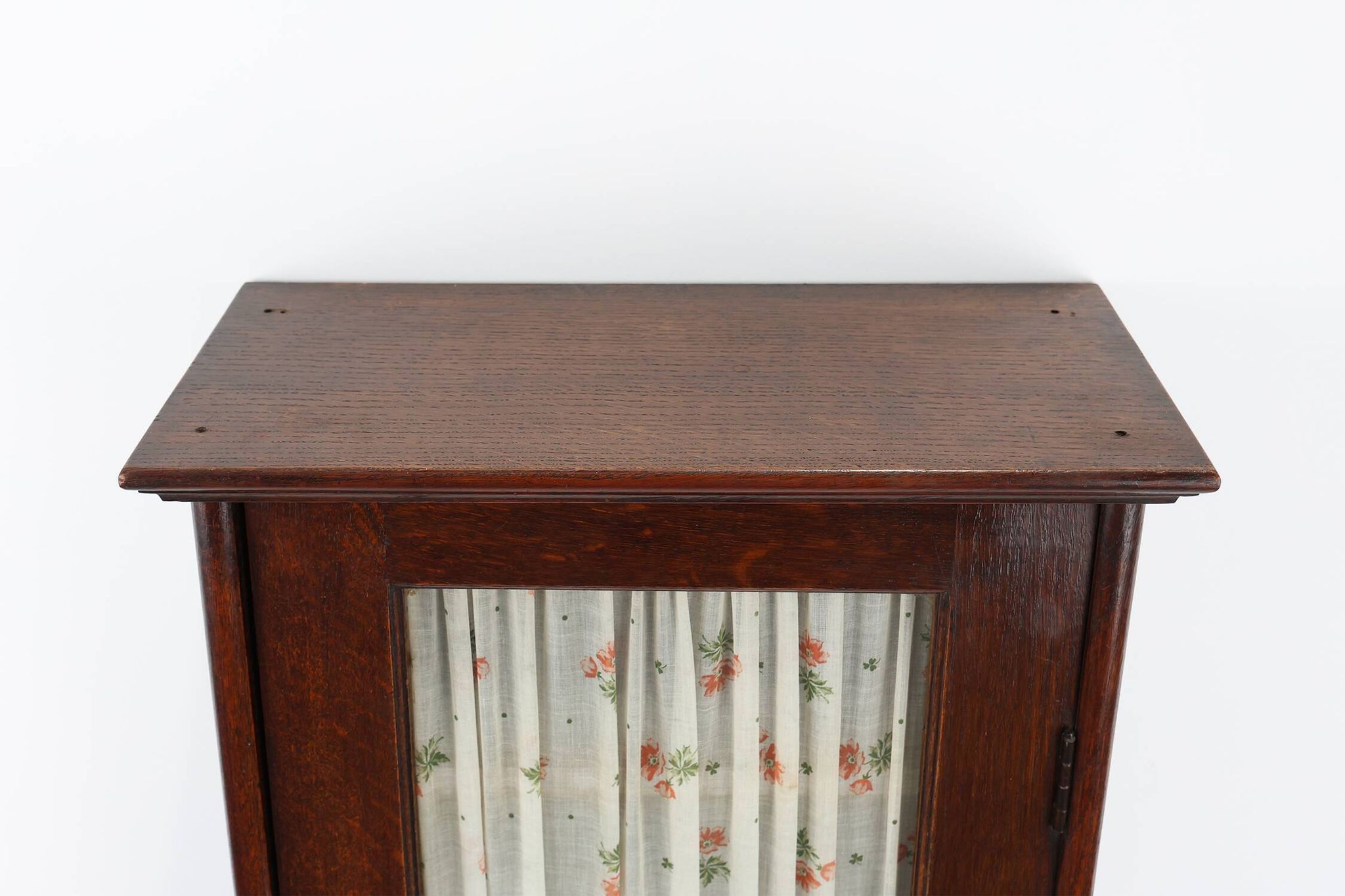 French Art Deco tall cabinet with glass door and hidden compartiment, ca. 1