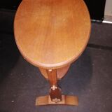 small old oval table made of wood