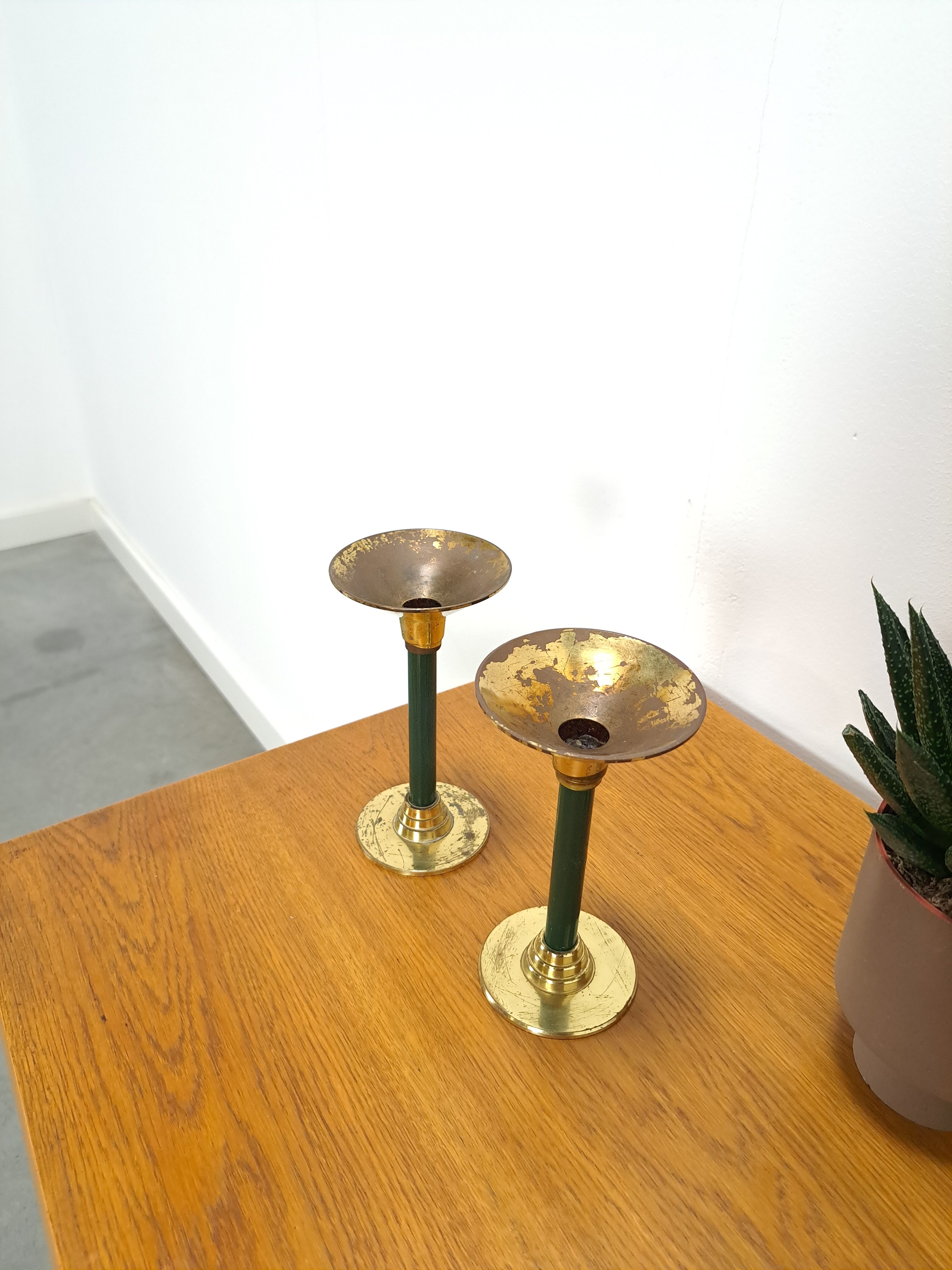 Brass candlesticks with dark green vintage