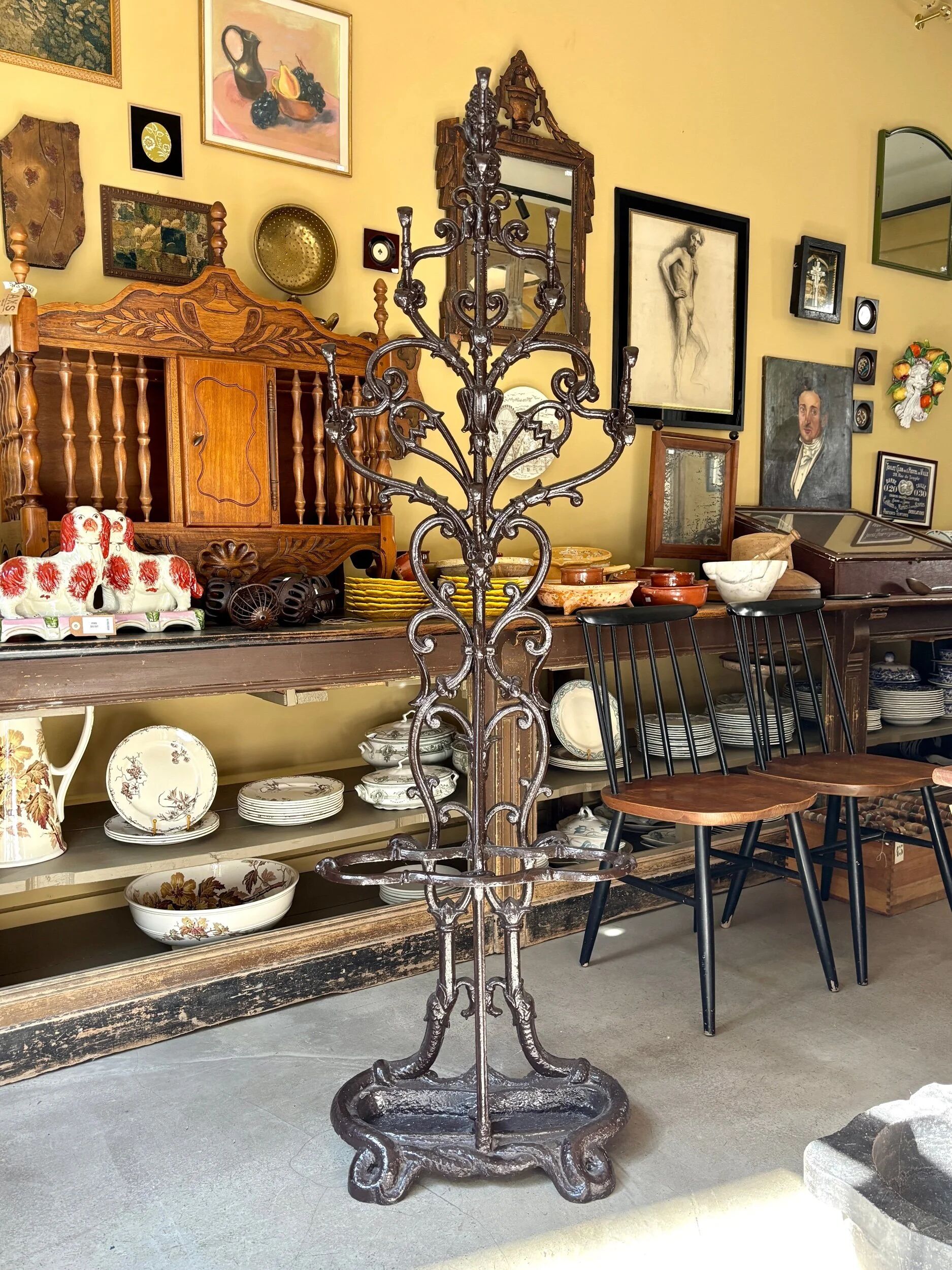 Coat rack with 6 hooks and cast iron brown umbrella stand.