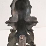 Pair of bronze andirons with black patina, 19th century, female caryatids