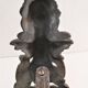 Pair of bronze andirons with black patina, 19th century, female caryatids