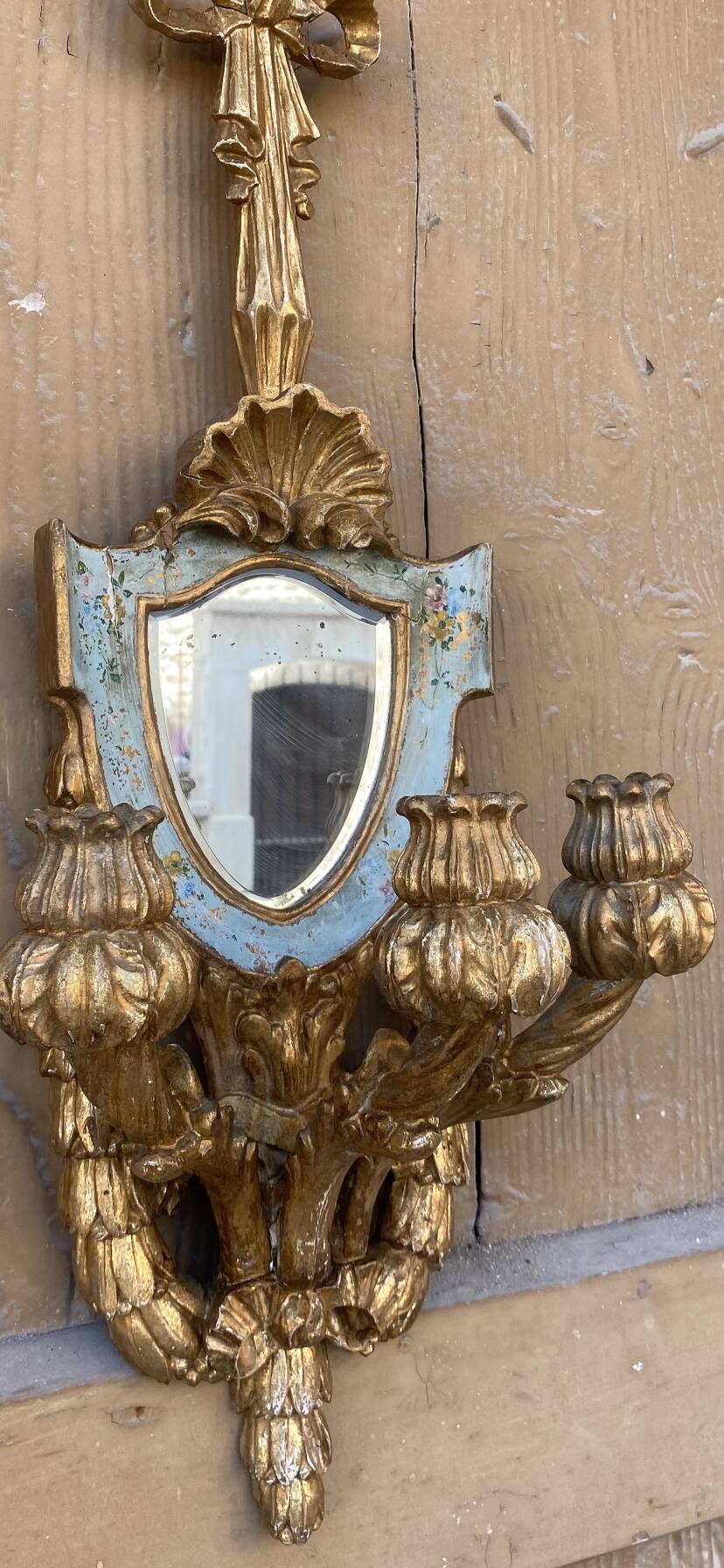 Pair of carved wood sconces