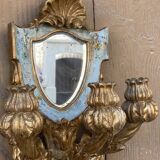 Pair of carved wood sconces