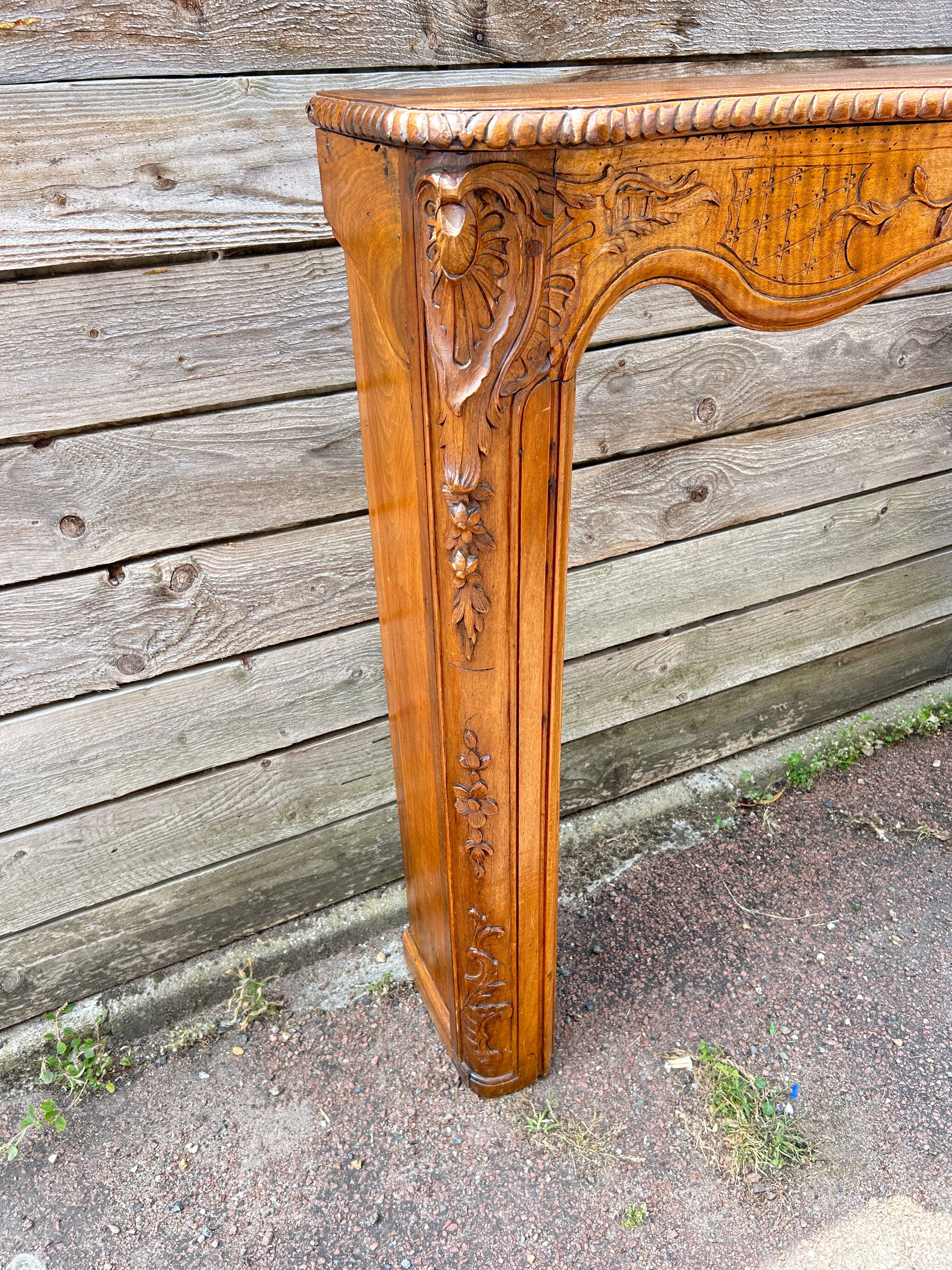 Fireplace surround in Louis XV style woodwork