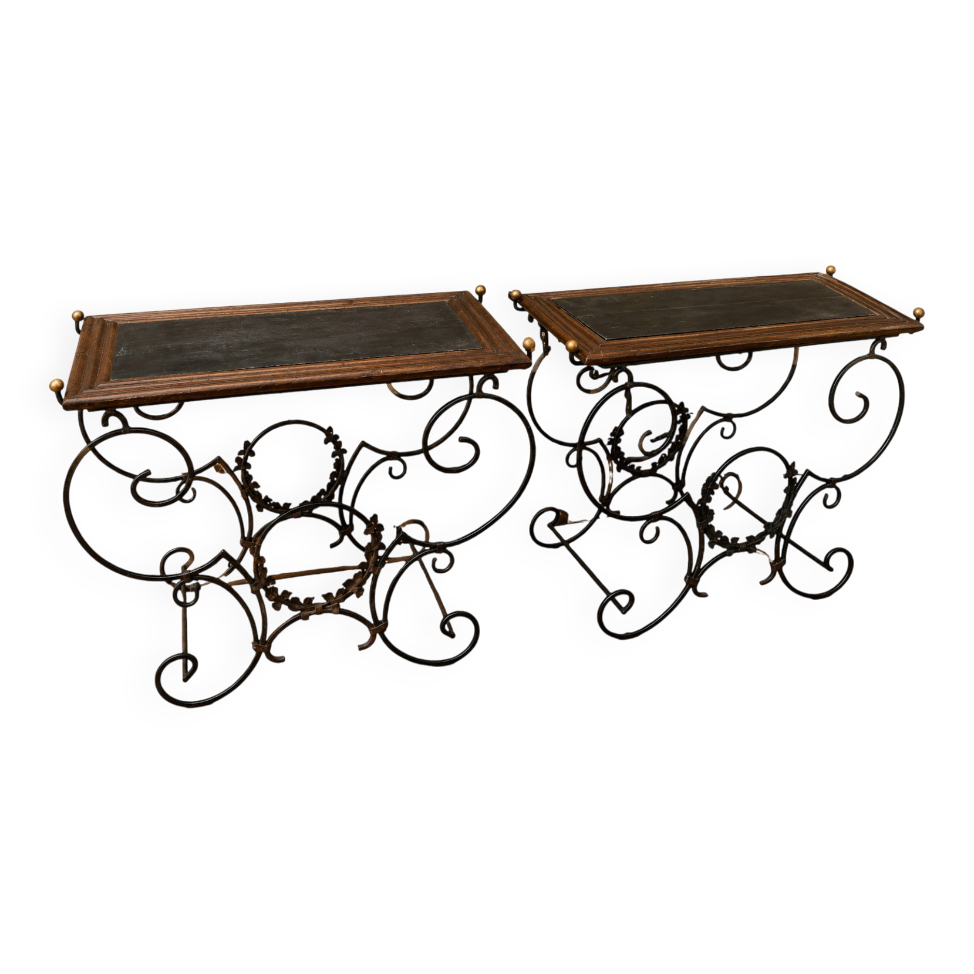 Pair of wrought iron and blackened wood consoles from the mid-20th century.