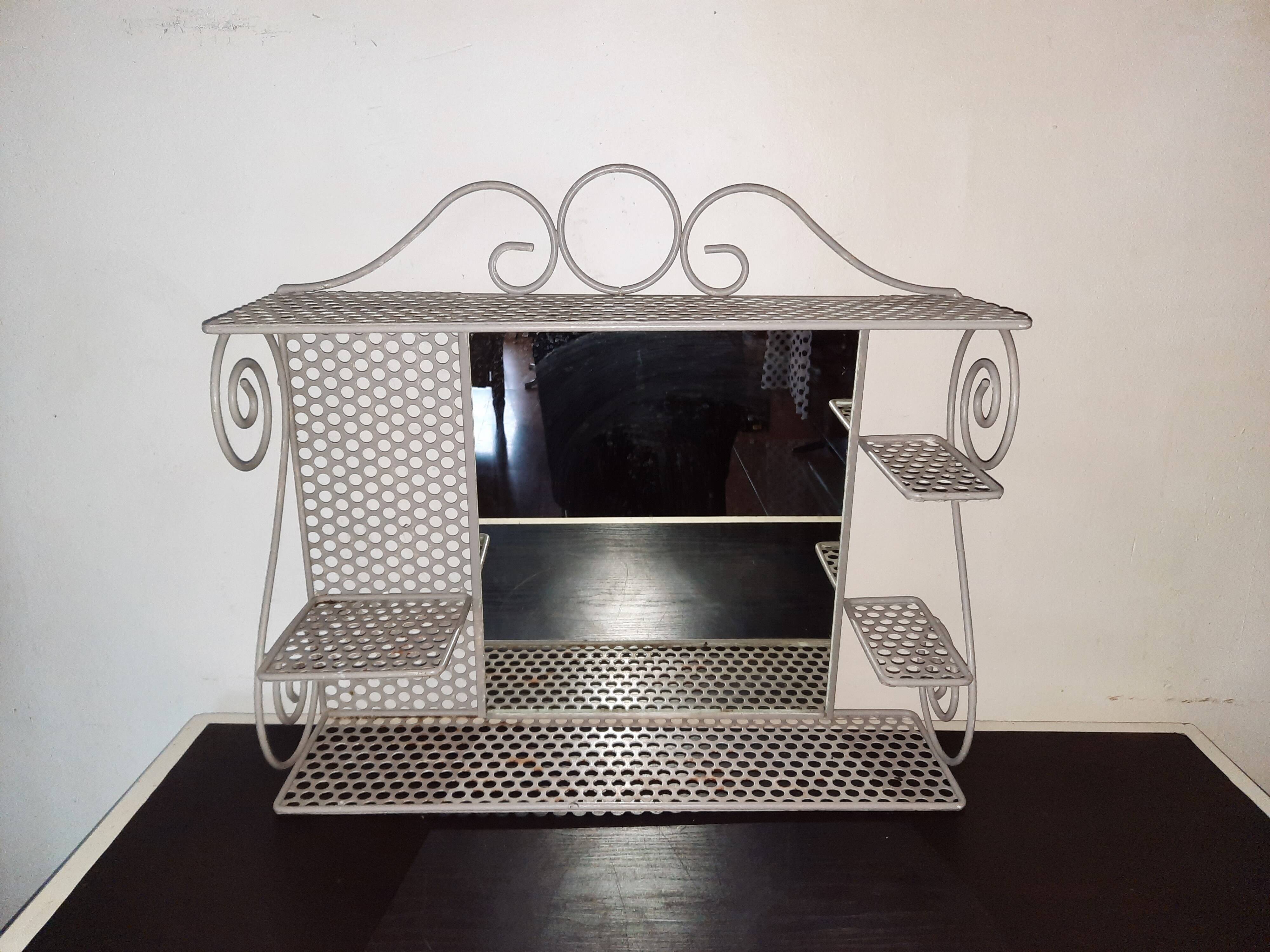 Vintage metal shelf with mirror
