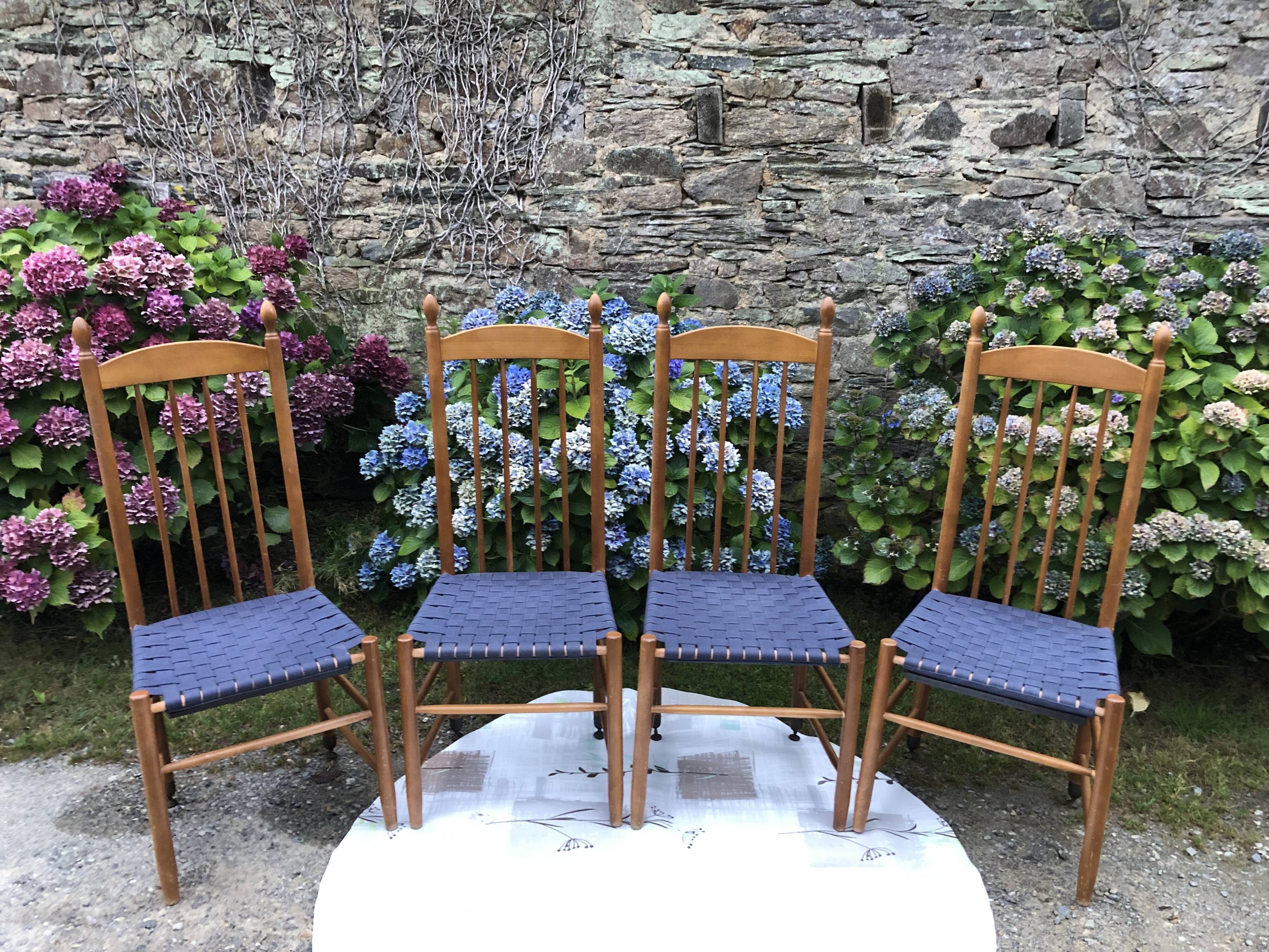 4 vintage Roche Bobois chairs from the 80s in beech with woven seats in blue fabric.