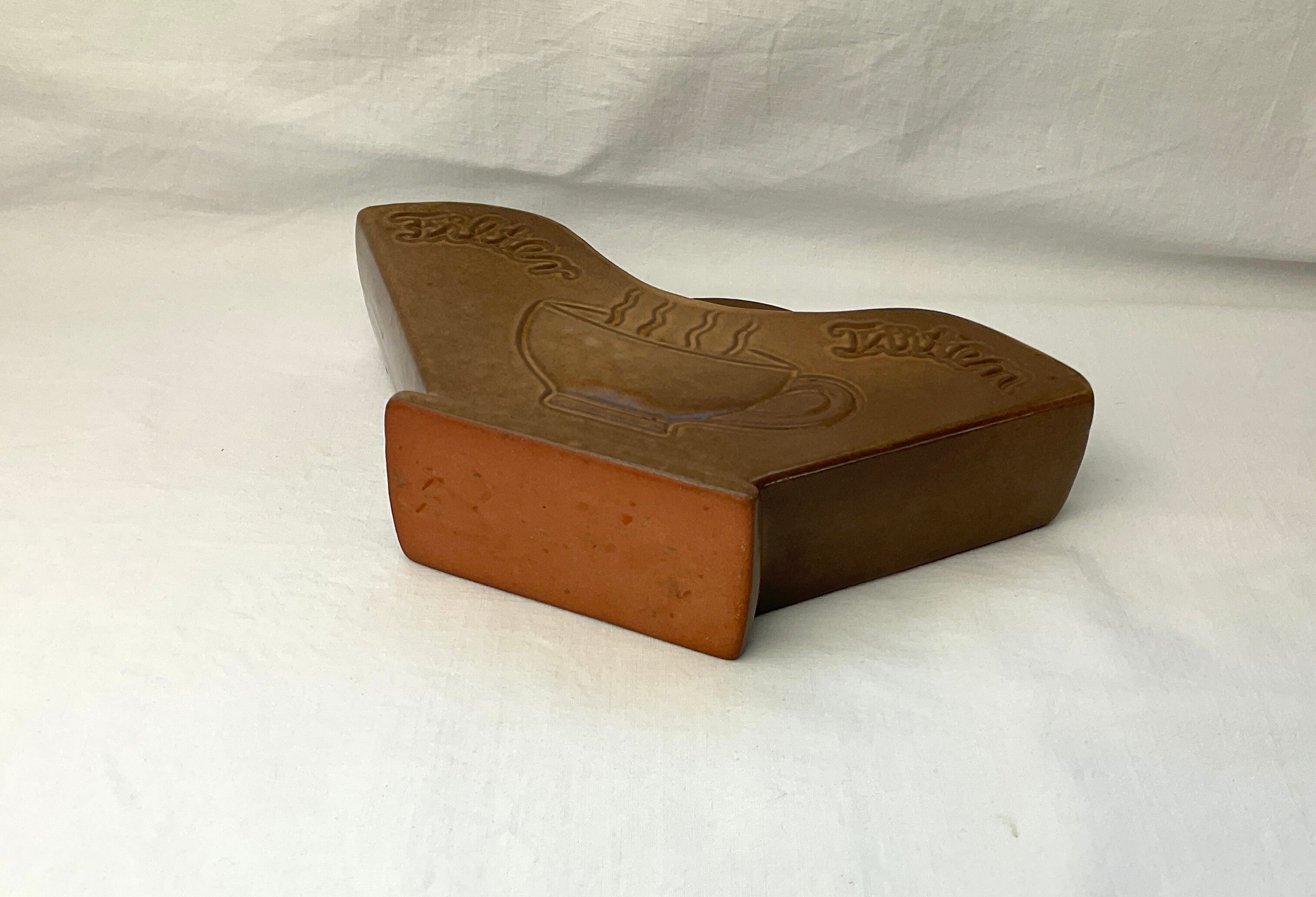 Wall-mounted terracotta coffee filter pot