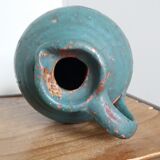 Sandstone pitcher painted in turquoise, very old pottery