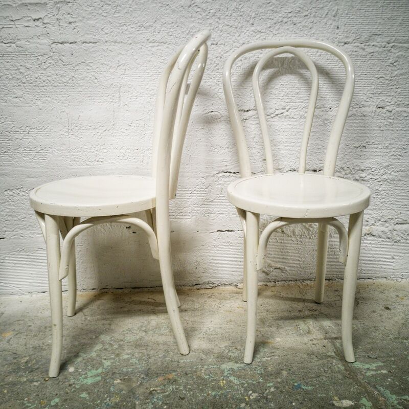 Pair of white Baumann bistro chairs