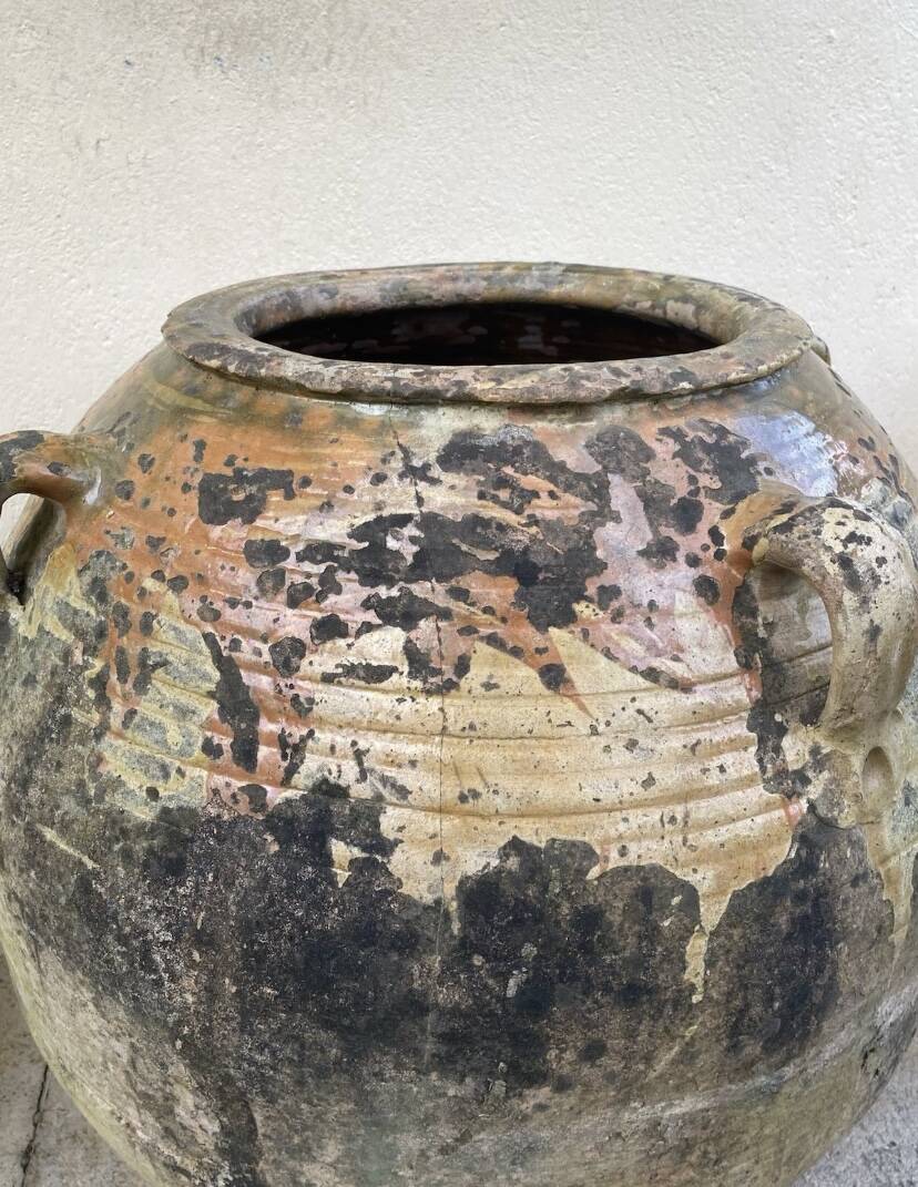 Large ancient jar in glazed terracotta