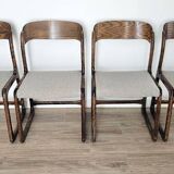 Set of 4 vintage Baumann "Sled" chairs in bent wood.