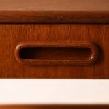 Bedside table with rattan magazine rack