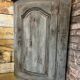 Eighteenth-century corner cabinet with a patina.