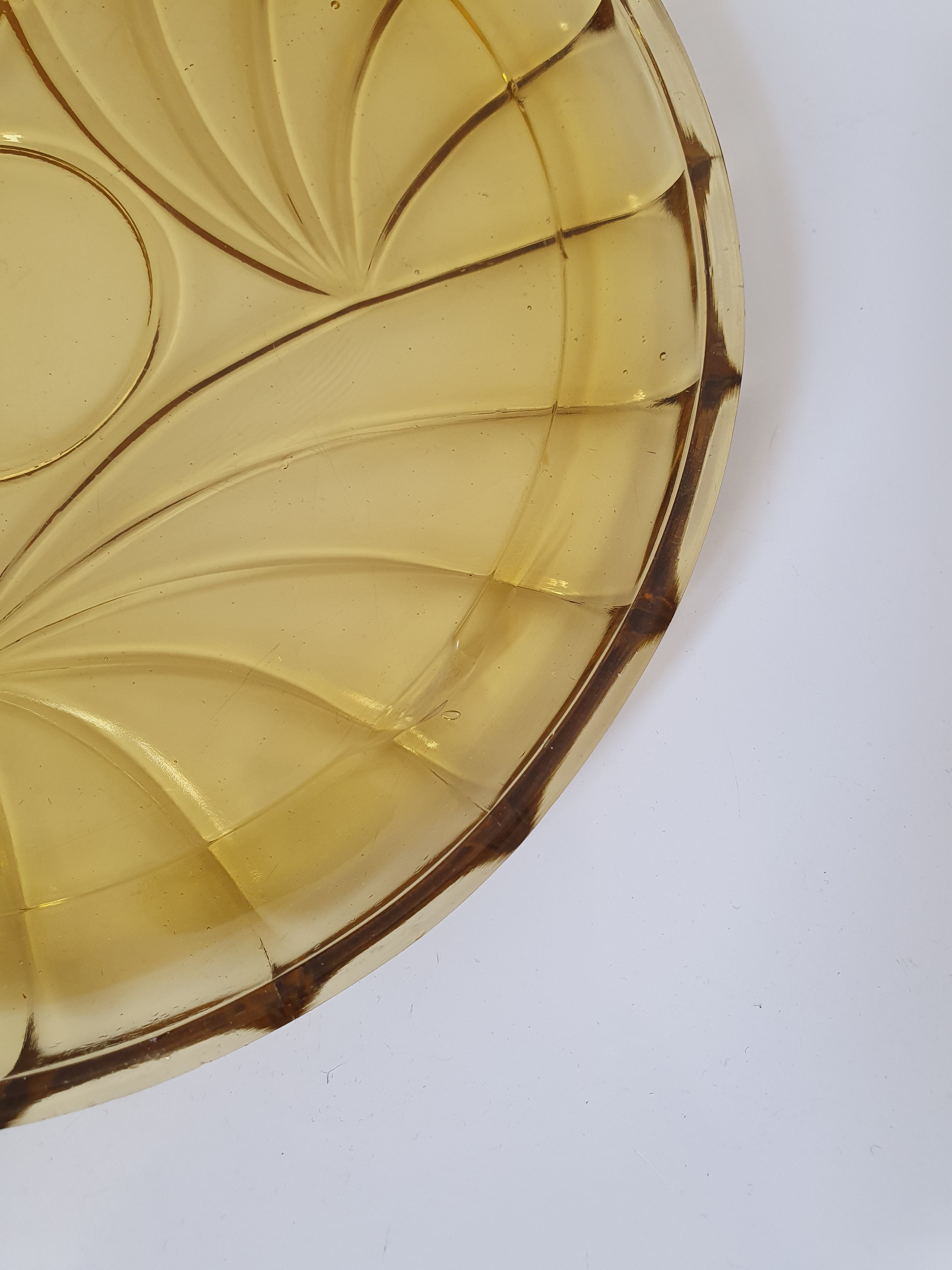 Bell and smoked yellow glass dish