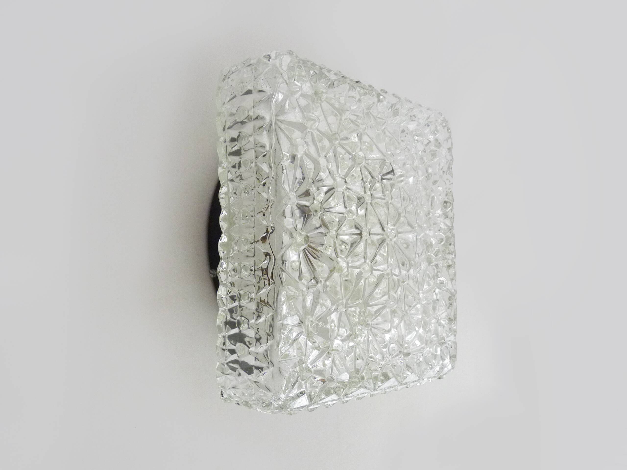 Wall lamp or ceiling light in glass and metal from the 50s and 60s.