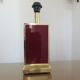 Lampe en laiton et plexiglas bordeaux années 70