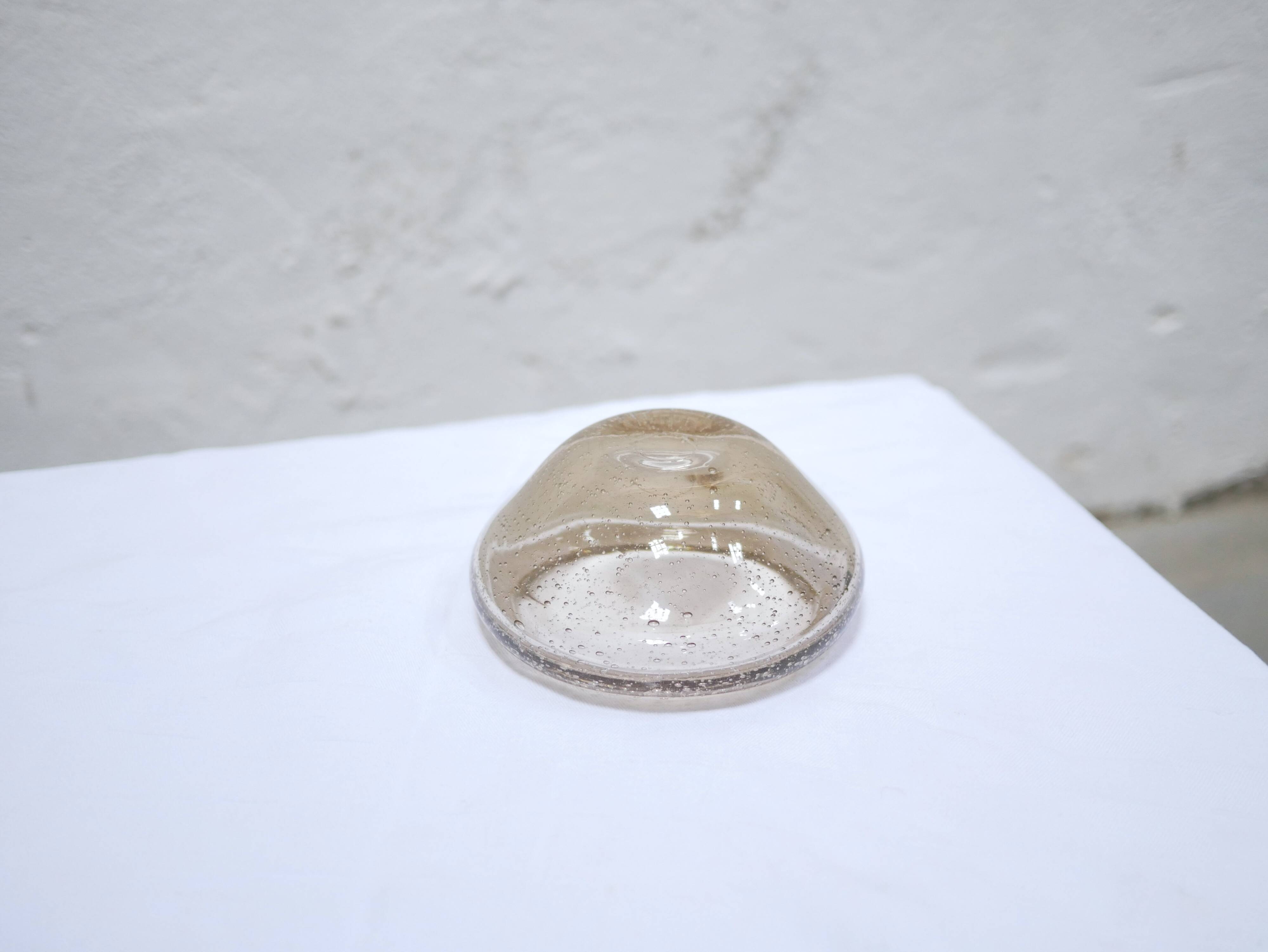 Empty vintage glass pocket blown by the glassworks of Biot