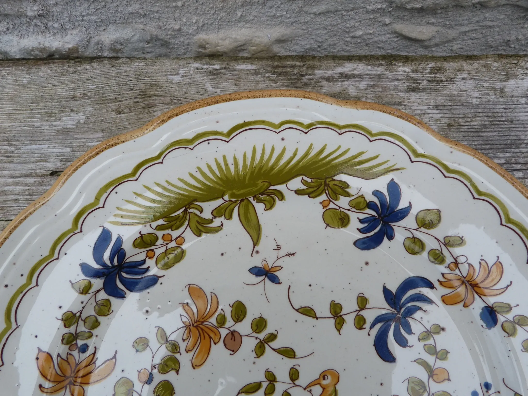 Plate reproduction of old Moustier from the 18th century.