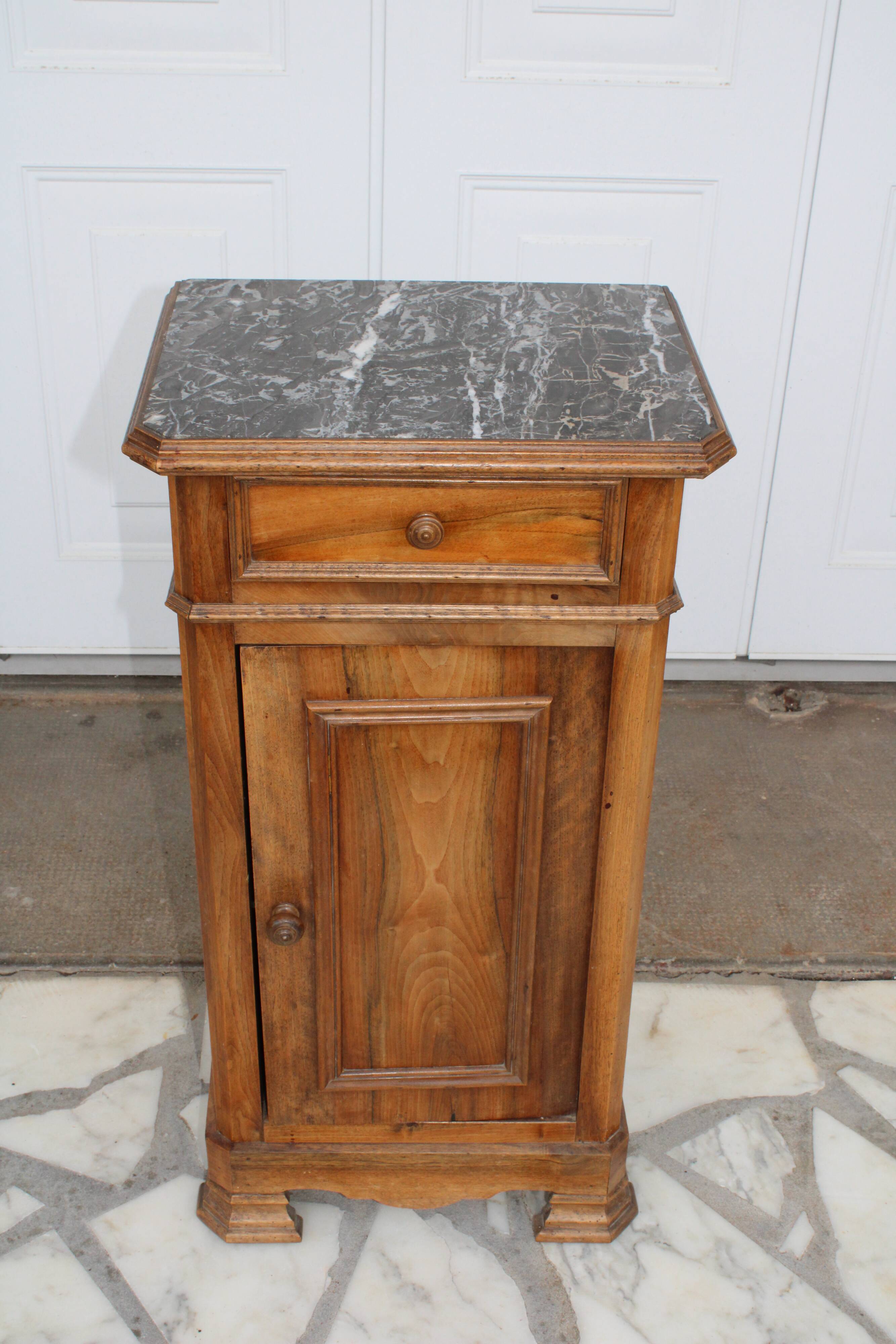 Antique bedside table with marble top