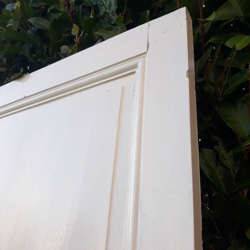 Communication door H220xW80.5cm, old panelled with moulding.