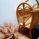 Antique rattan magazine rack