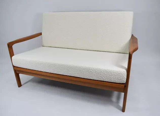 1960s canapé, in teak and white boucle.