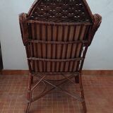 Old rattan armchair circa 1900-1930