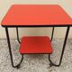 Table d'appoint rouge en Skaï