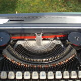 Typewriter in very good condition revised japy inter with his satchel