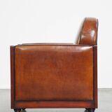 Cognac-colored sheepskin Art Deco design armchair in good condition