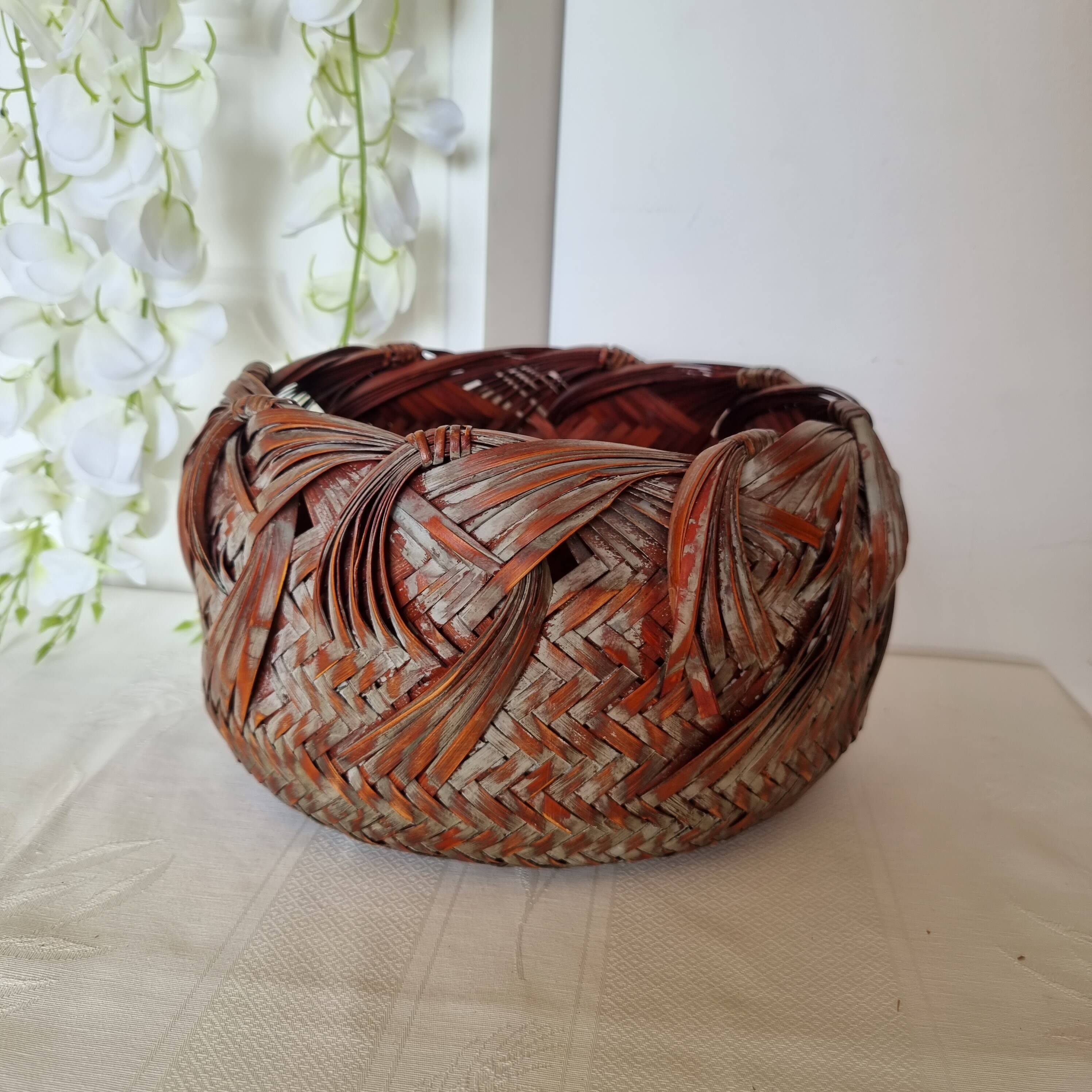 Vintage Japanese Ikebana basket made of smoked bamboo in natural