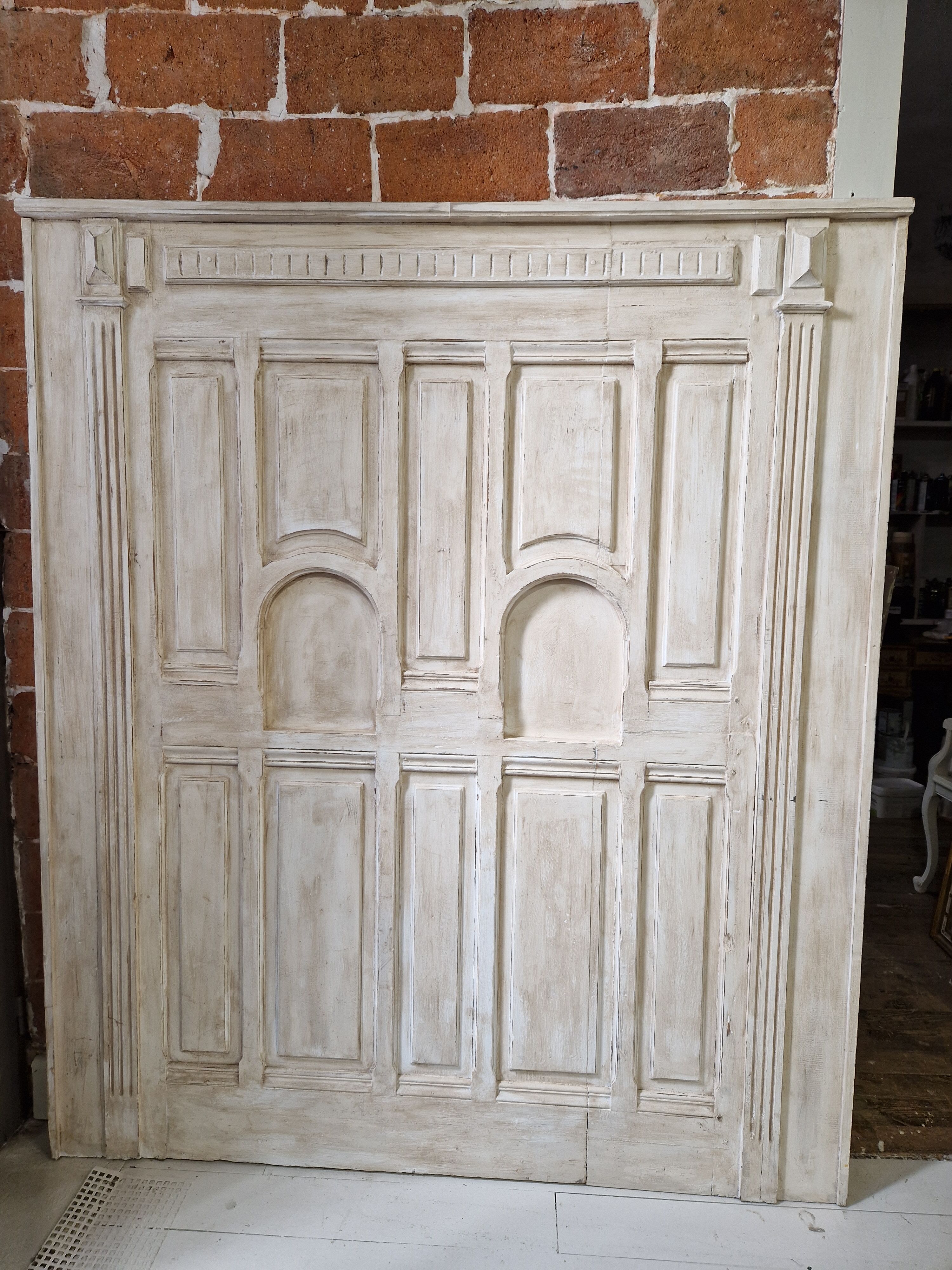 patinated wooden headboard