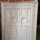 patinated wooden headboard