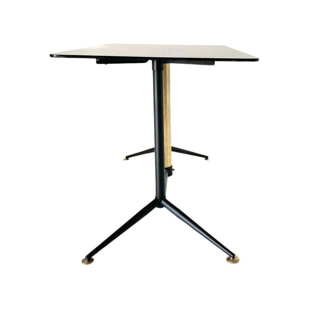 Vintage coffee table with smoked glass top and iron and brass base, Italy 1960s