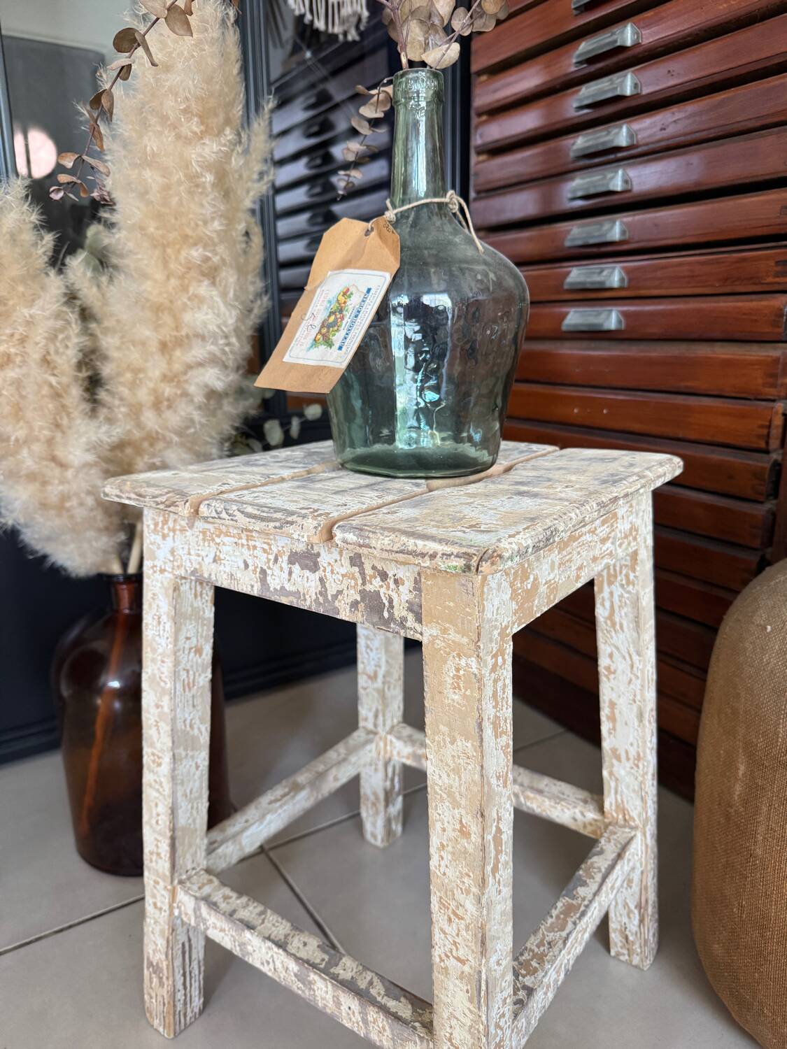 Old wooden stool with square seat