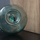 Old blown glass bottle, amphora-shaped