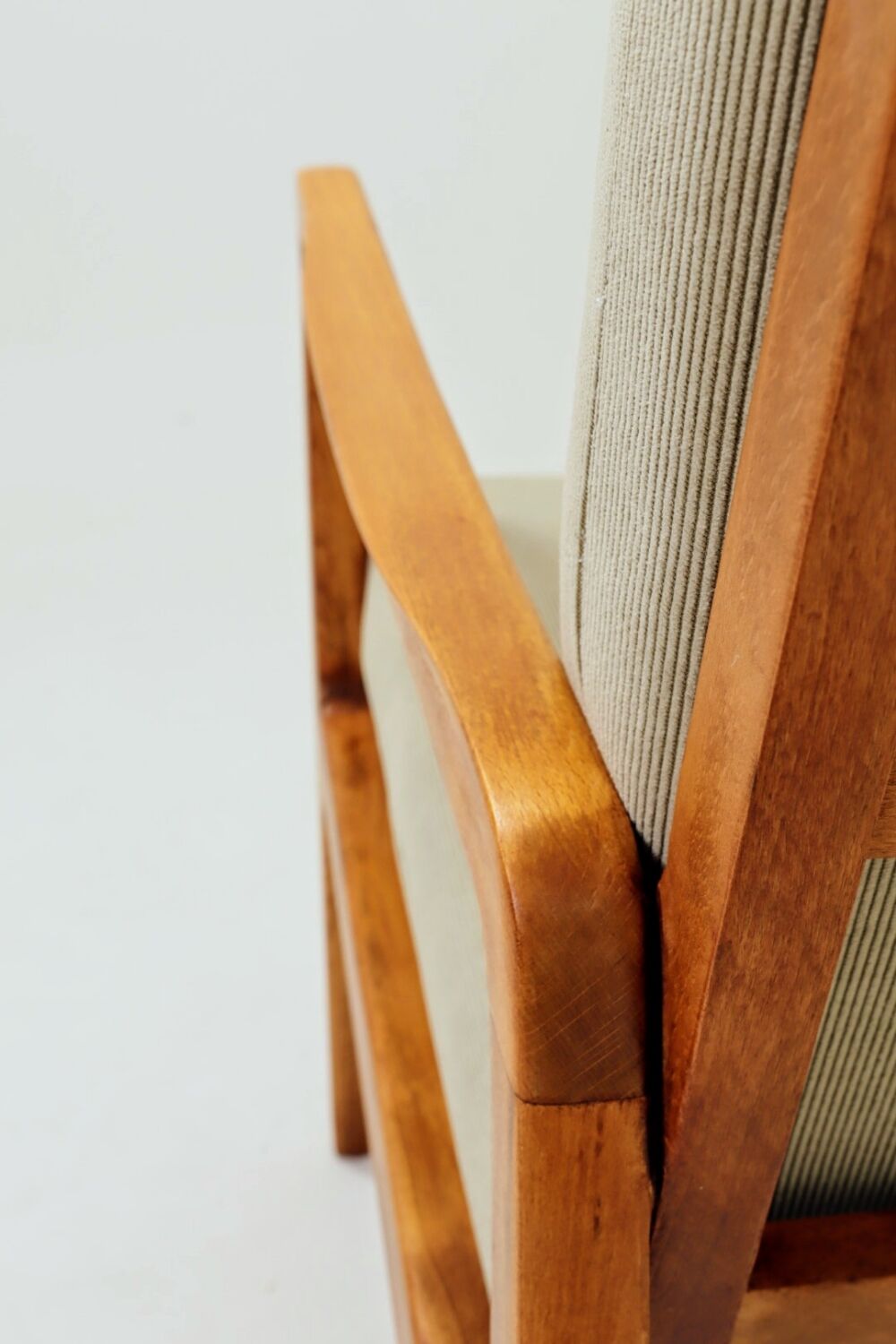 Vintage armchair in khaki corduroy, mid-century modern design from the 1960s.