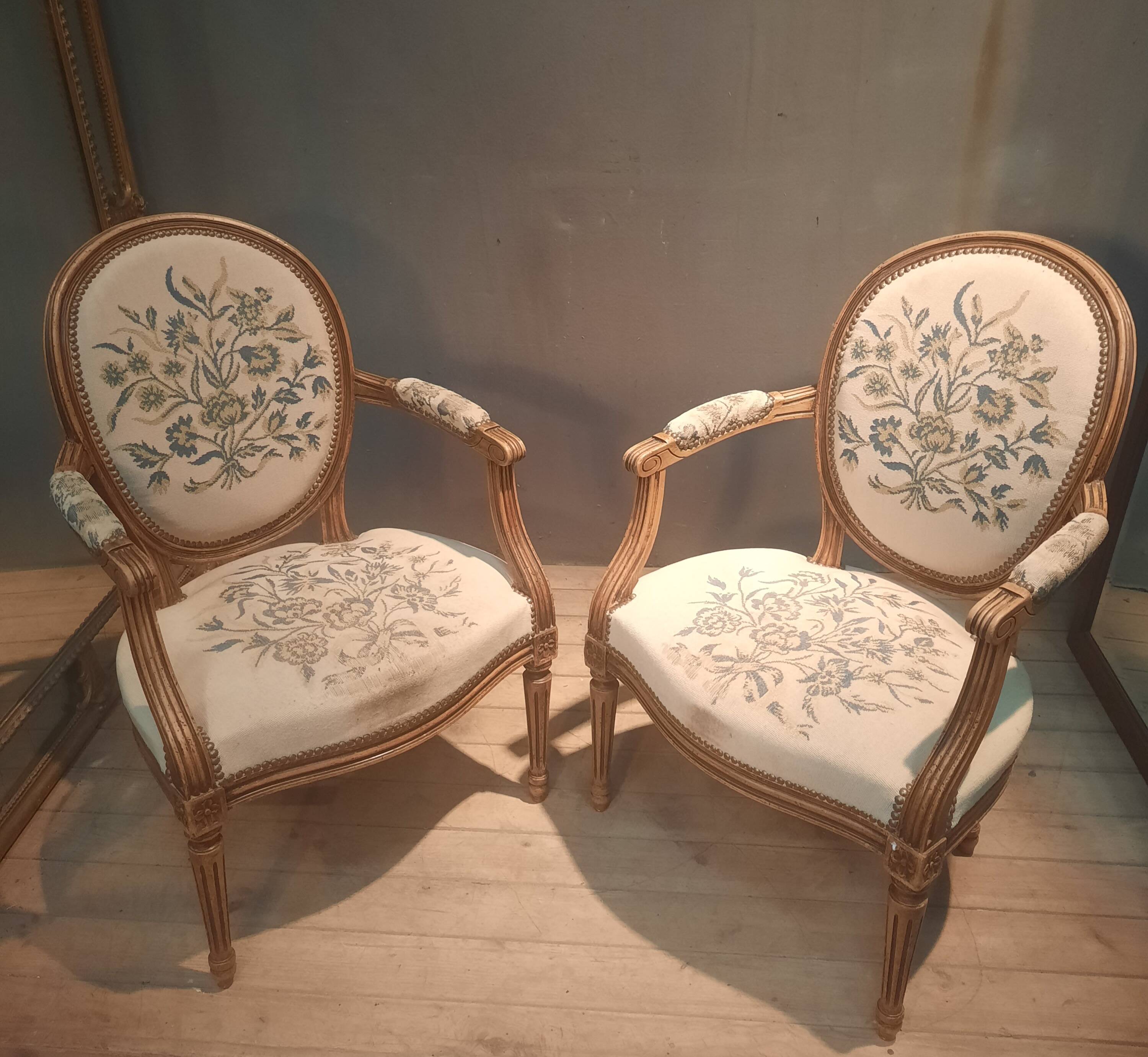 Pair of Louis XV style medallion armchairs.