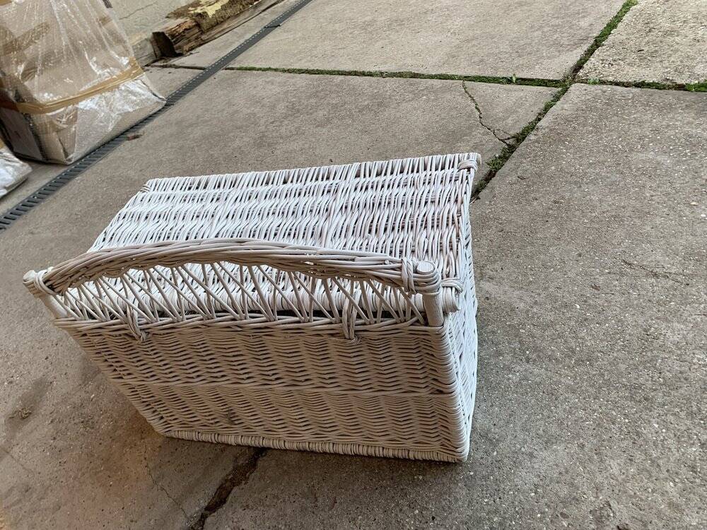 Vintage white wicker chest with double lid and decorative weaving.
