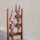 2 sculptural brutalist high-back chairs