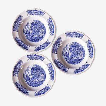 Trio of hollow porcelain plates