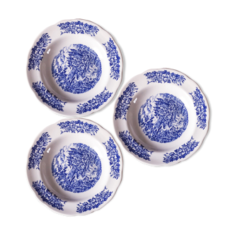 Trio of hollow porcelain plates